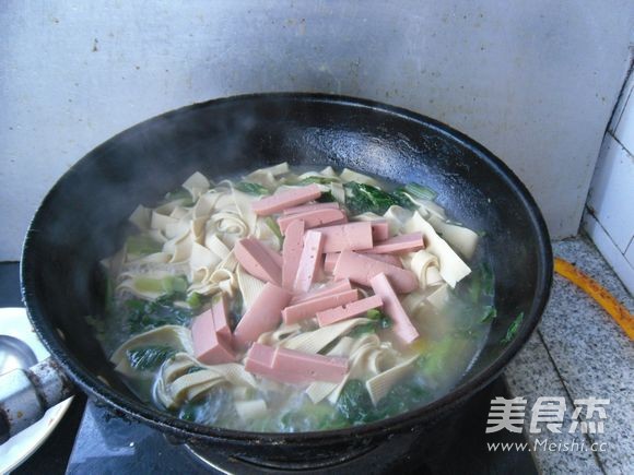 豆皮烧牛肉肠怎么炖